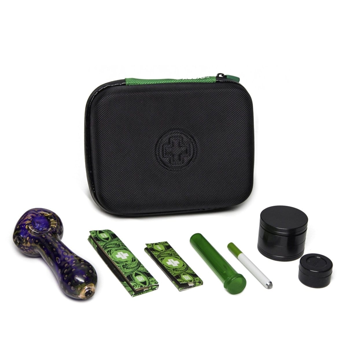 A top-down view of The Very Happy Kit, displaying a green case open with various smoking accessories inside.