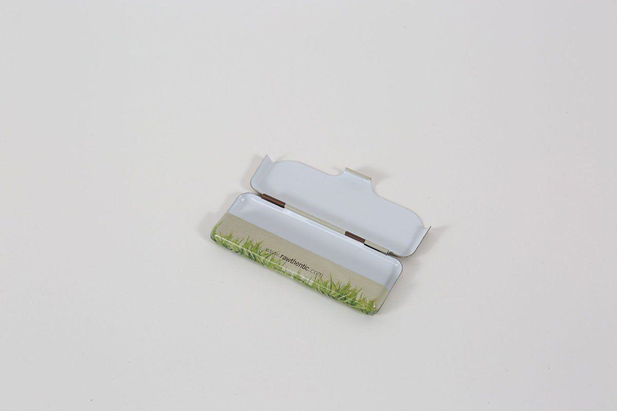 Open Raw Paper Tin viewed from above, displaying its metallic surface and empty interior.