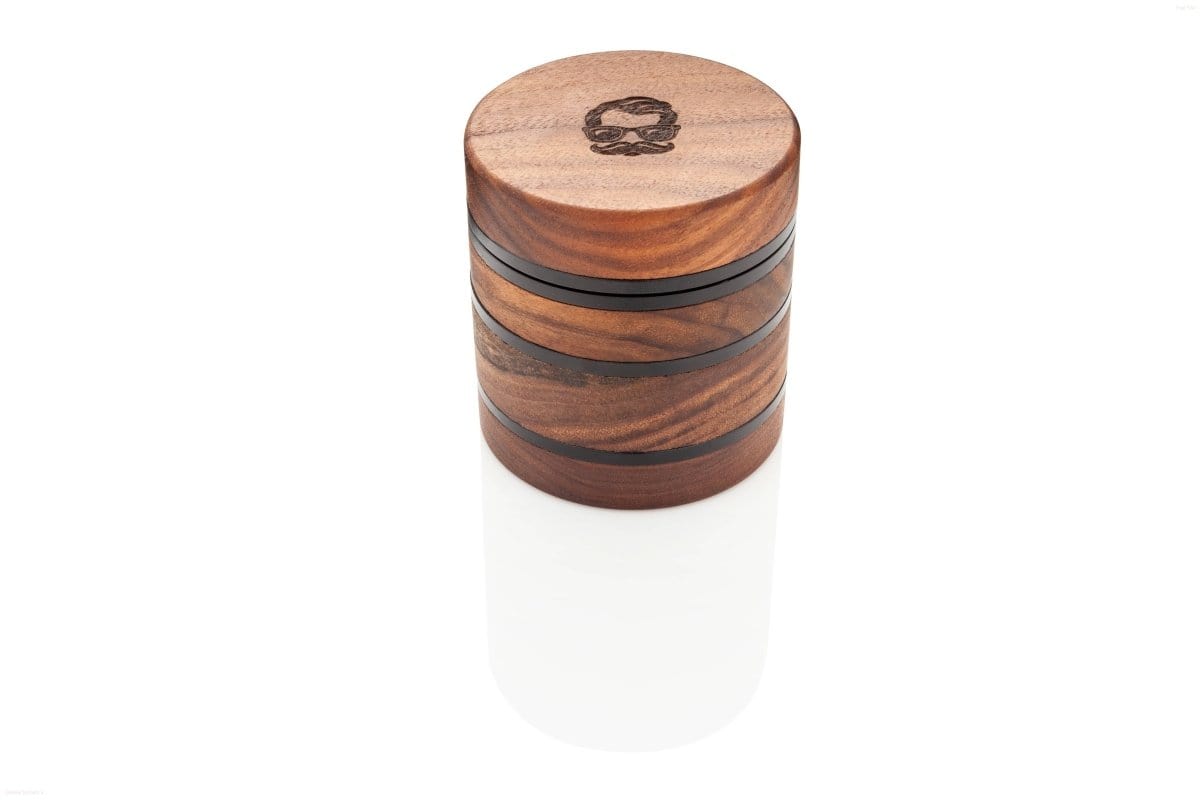 Front view of the Troy Herb Grinder, a multi-tiered cylindrical grinder with a wood-grain finish.