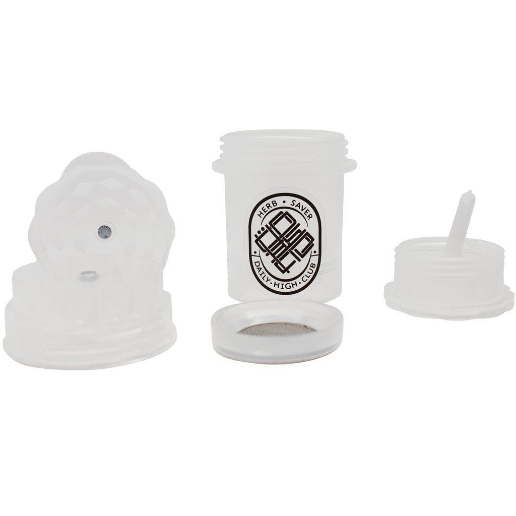 A close-up, top-down view of the Mini Daily High Club x Herbsaver Grinder, showing its circular shape and metallic finish.