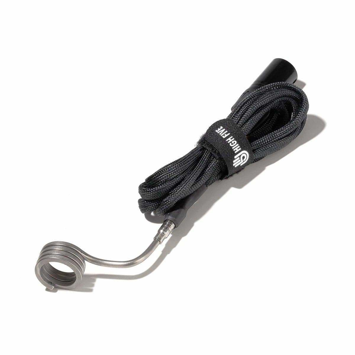 A detailed close-up of the 20mm Barrel Coil, showing its metallic construction and curved design against a dark backdrop.