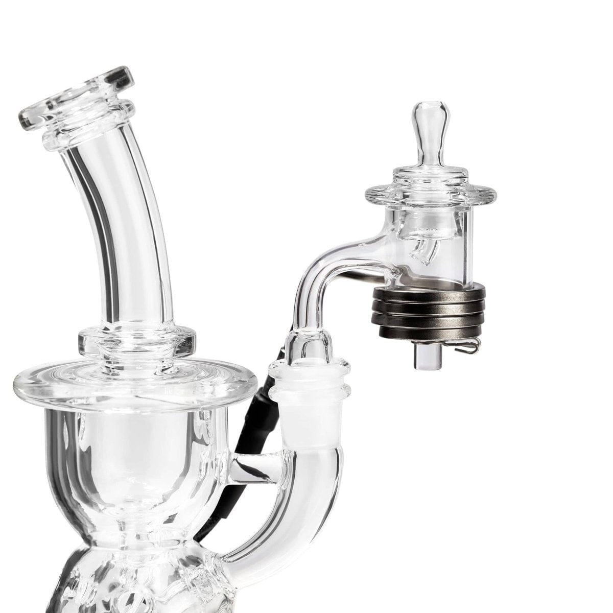 Close-up of the Micro E-Nail Quartz E-Banger Kit attached to a clear glass water pipe, angled from the side with soft lighting.