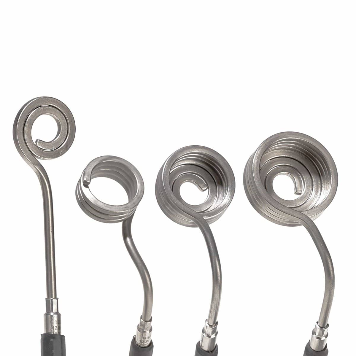 A close-up, angled view of the Micro E-Nail with Heater Coil, showing its coiled heating element and metallic finish.