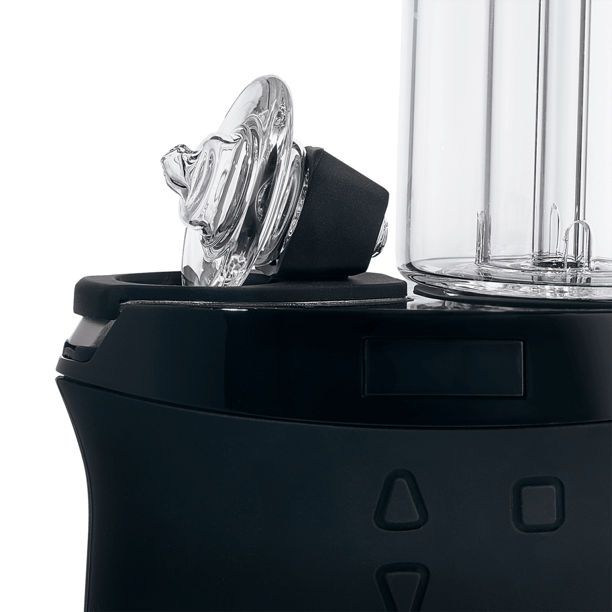 Close-up, angled view of the DUO, a clear glass piece with a unique, multi-chambered design.