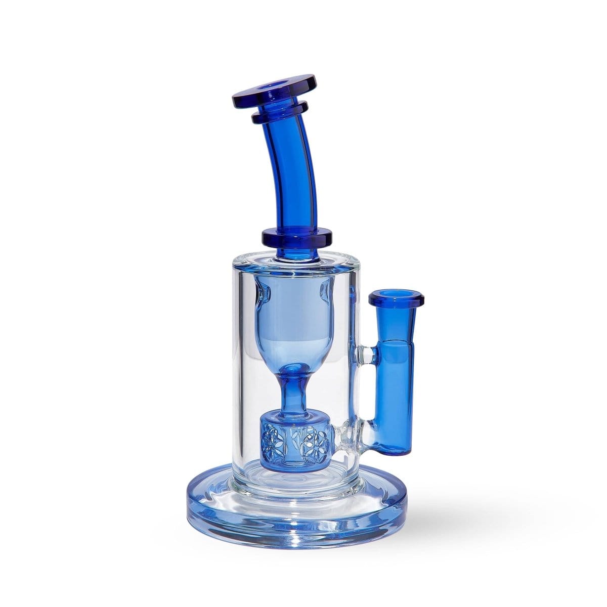 Front three-quarter view of the Torus in translucent cobalt blue glass showing its cylindrical body, angled mouthpiece, side tube handle, and decorative percolator.