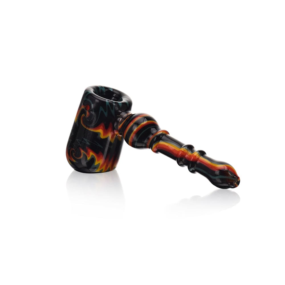 A studio shot of the High Society  Eris Premium Wig Wag Bubbler (Black Rainbow V1), displaying its colorful, patterned glass from a side angle.