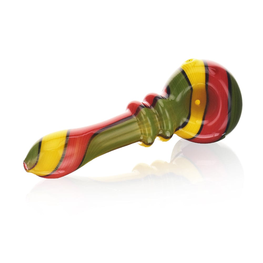 A three-quarter view of the High Society  Helia Premium Wig Wag Spoon (Rasta) featuring a vibrant, colorful design and reflective surface.