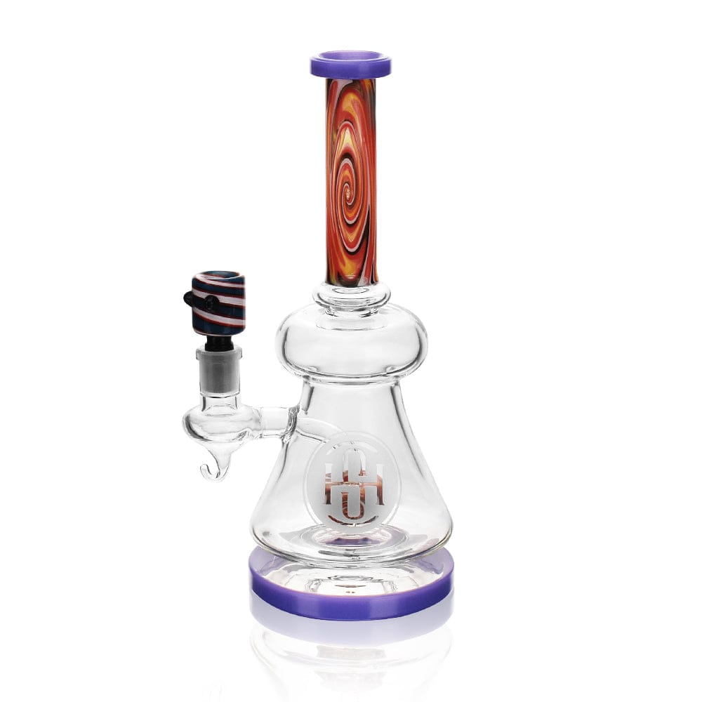 A studio shot of the High Society - Pegasi Premium Wig Wag Hybrid Pipe (Purple) with a clear glass bowl and vibrant purple accents.