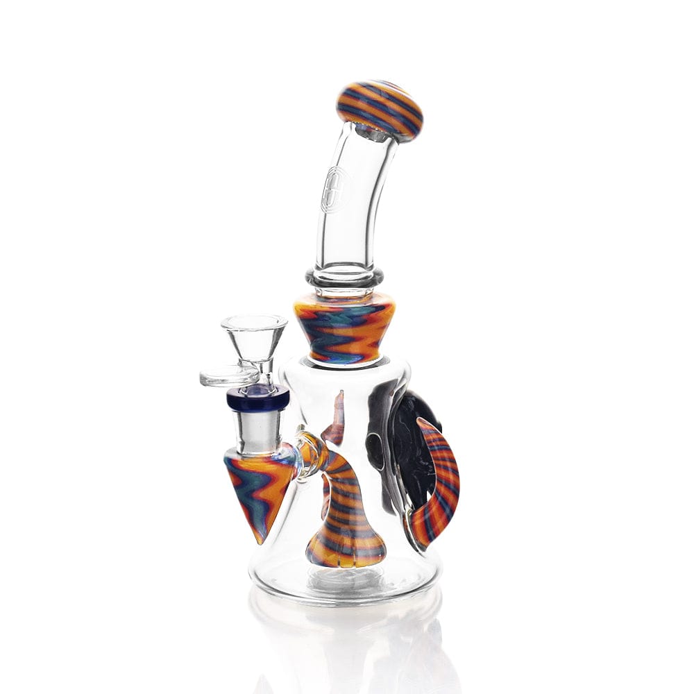 A three-quarter view of the High Society - Tulu Premium Wig Wag Concentrate Rig, showcasing its blue and yellow glasswork on a reflective surface.