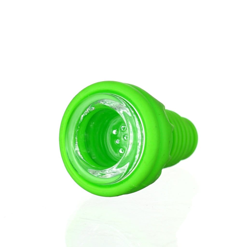 Close-up view of The Unibowl Silicone Bowl, a small, green silicone bowl angled against a plain white background.