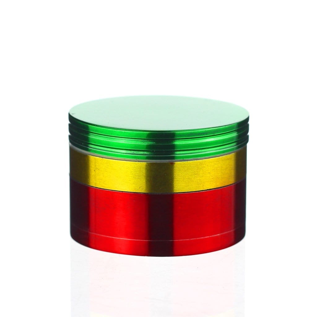 Front view of the Rasta Grinder, showcasing its multi-tiered, cylindrical shape and colorful metallic finish.