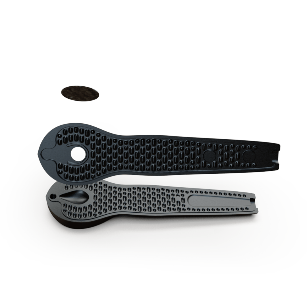 A top-down view of the KØL Mini 2.0 Titanium Travel Utensil Set, showcasing the sleek, metallic finish of the compact design.