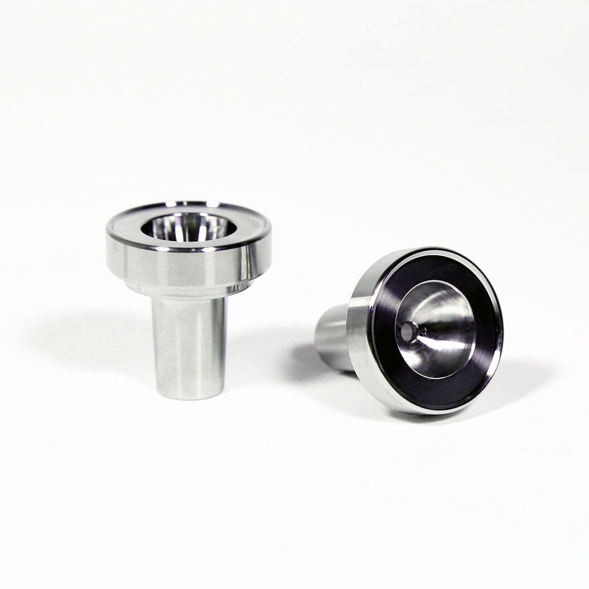 Close-up angled view of the Stainless Steel Bowl Piece, showcasing its metallic sheen and cylindrical form against a plain white background.