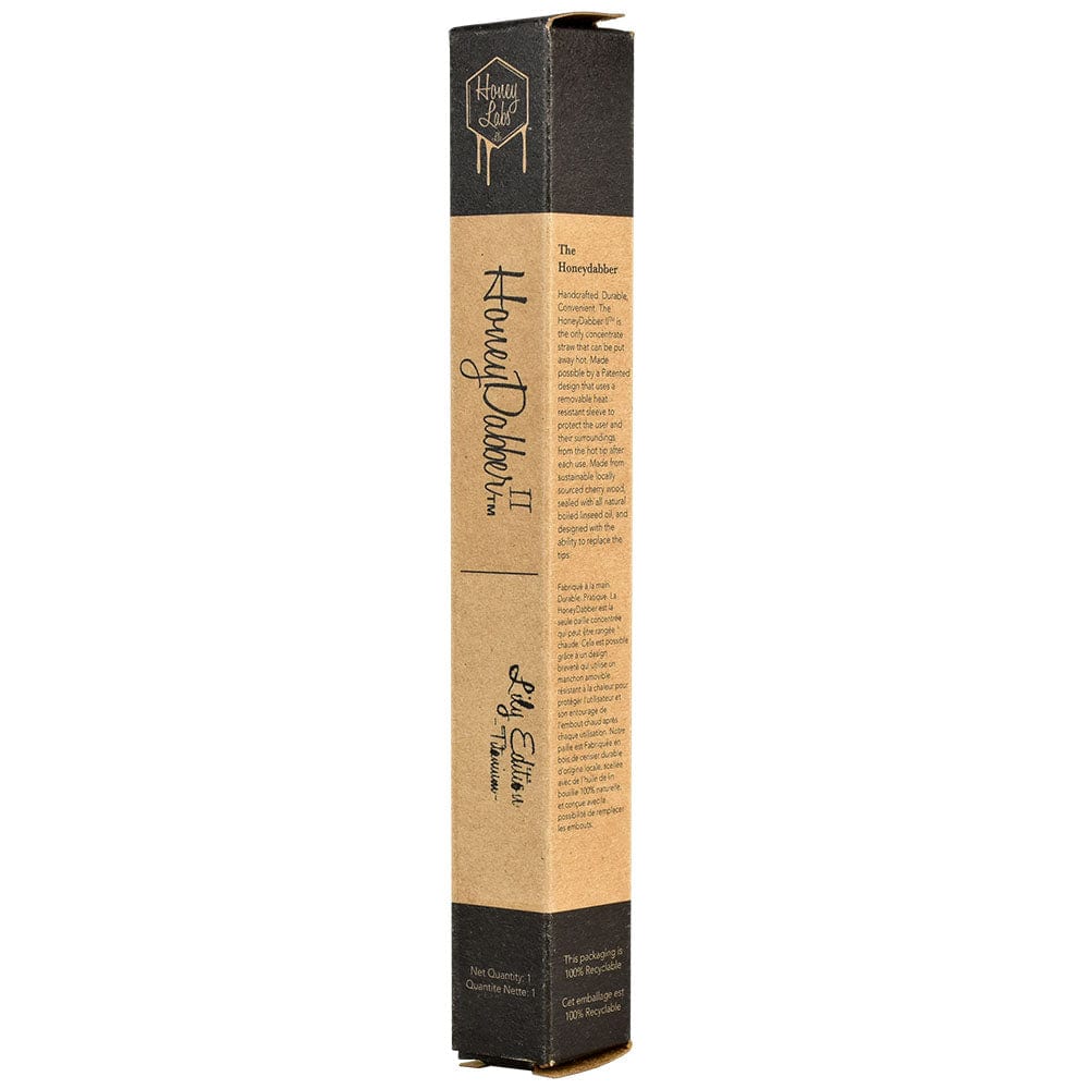 A straight-on shot of the Honey Labs Honey Dabber II Lilly Limited Edition in its packaging, showcasing the product's design.
