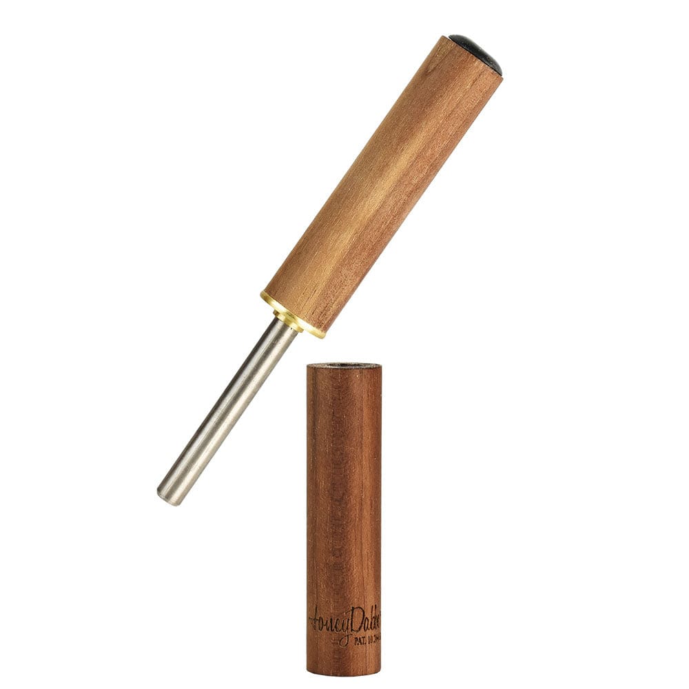 A diagonally angled view of the Honey Labs HoneyDabber II Black Walnut Vapor Straw, showcasing its sleek, cylindrical shape.