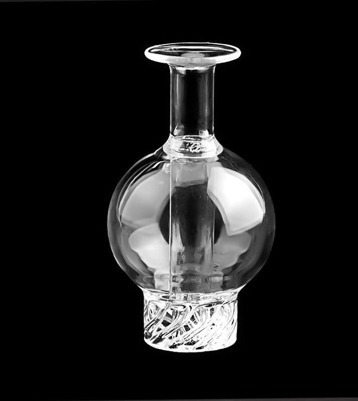 A close-up, angled view of the HONEY HIVE BUBBLE CARB CAP, showcasing its clear glass construction and rounded bubble shape.