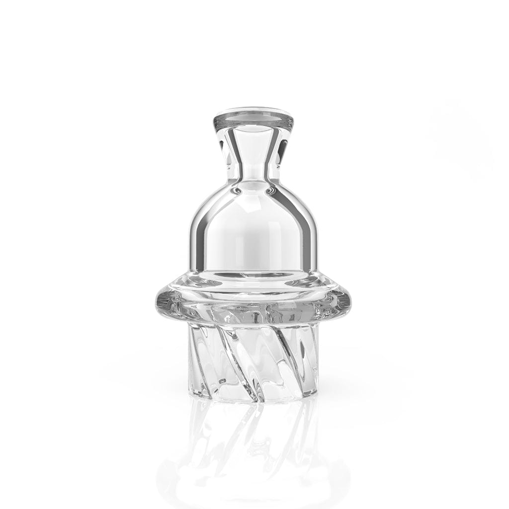 A close-up, angled view of the HONEY HIVE CARB CAP, showing its clear glass construction and rounded shape.