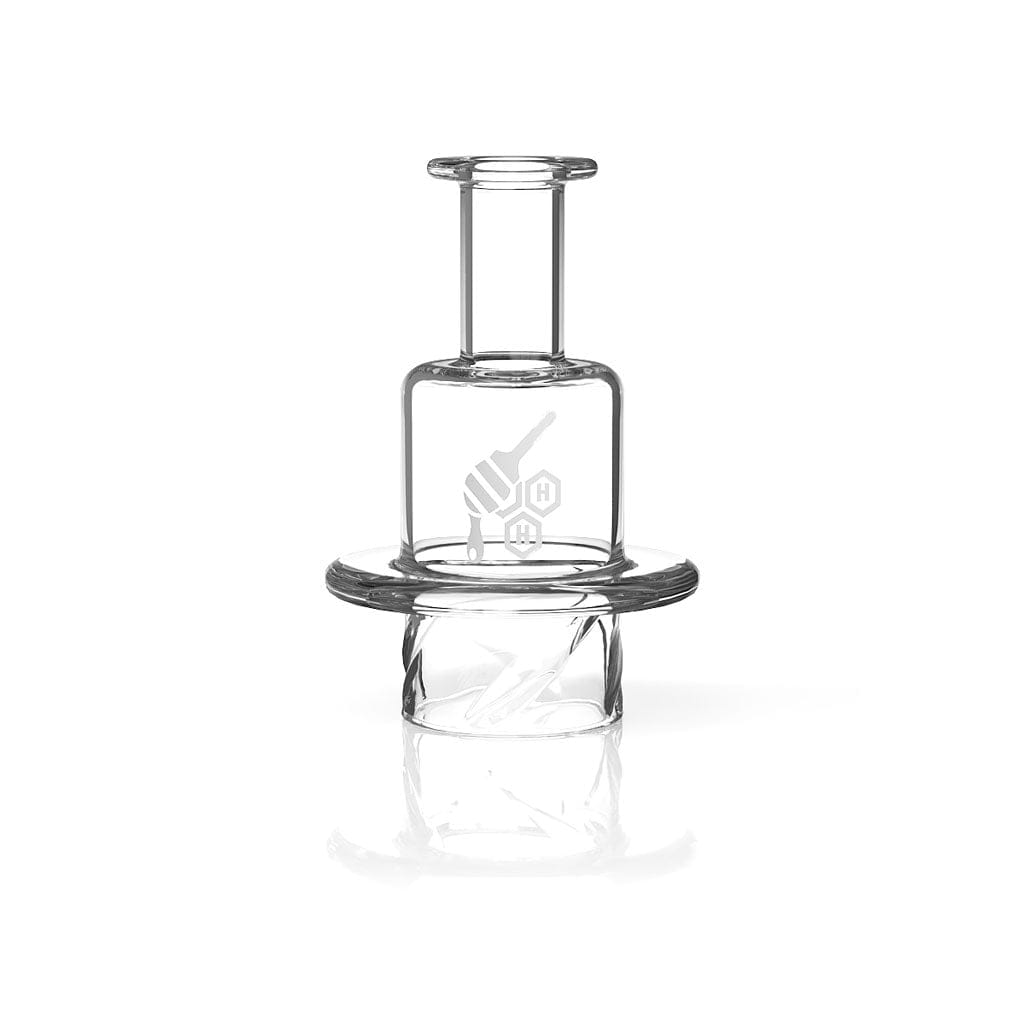 Front view of the QUARTZ HONEY HIVE CARB CAP, a clear, rounded cap angled against a dark backdrop.