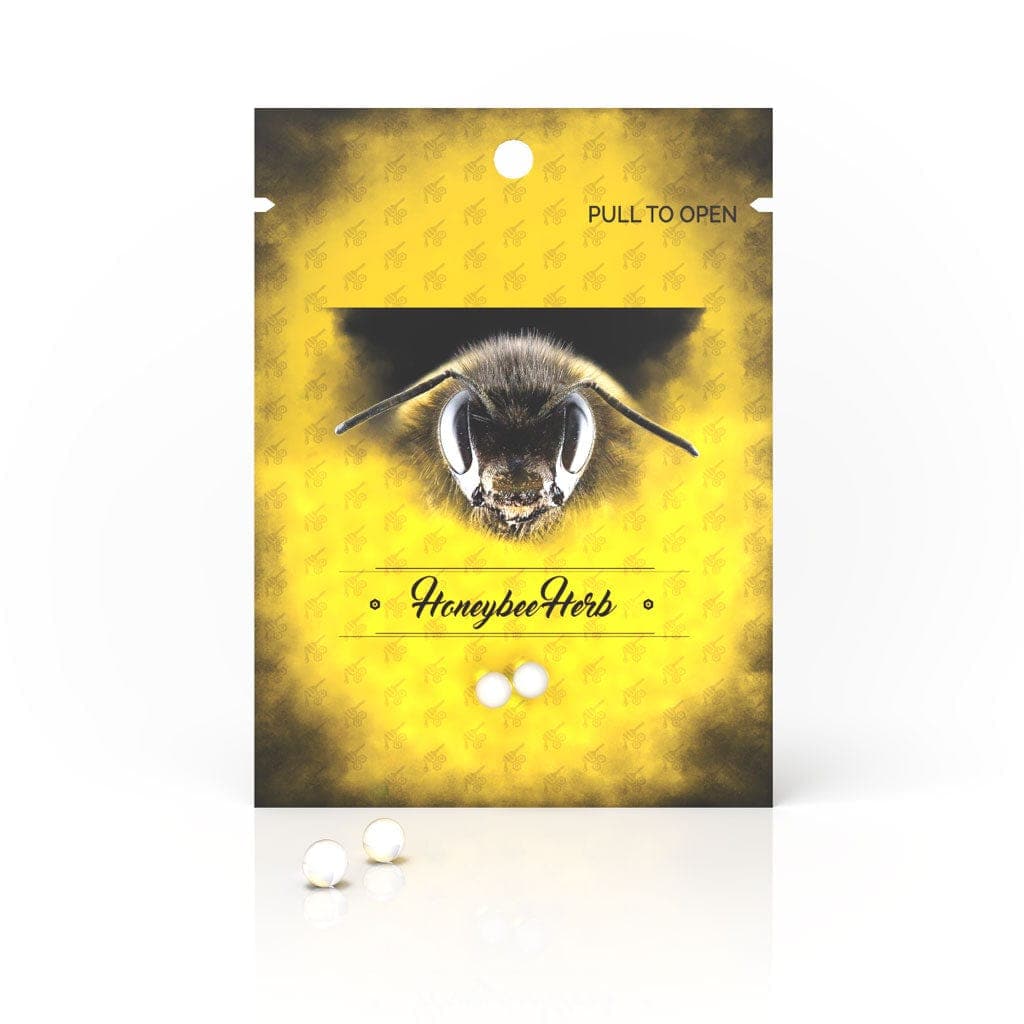 Front view of Honeybee Herb Honey Pearls packaging, showcasing a floral design with text that reads "pull to open."