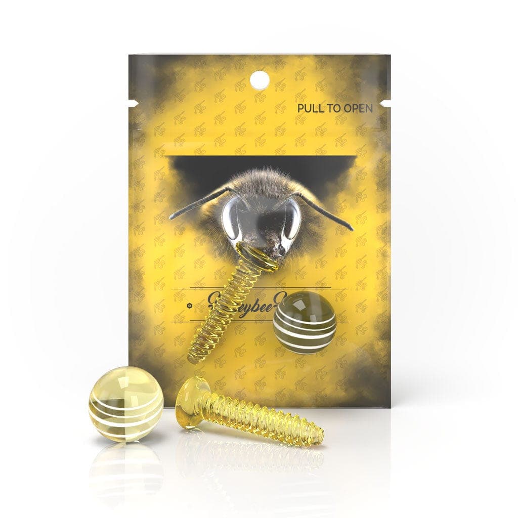 Close-up of the Honeybee Herb Dab Screw Set, showing the gold-toned screw against a textured yellow background.