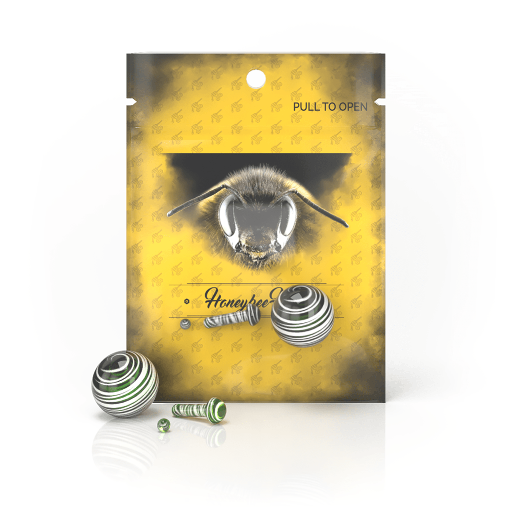 Front view of the Glass Mushroom Pillar Terp Set, showing a clear glass set against a textured yellow background.