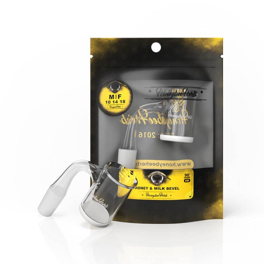 Front three-quarter view of the Honey & Milk Bevel Quartz Banger - 90° | Black Line leaning against its black-and-yellow branded pouch, shown on a white background.