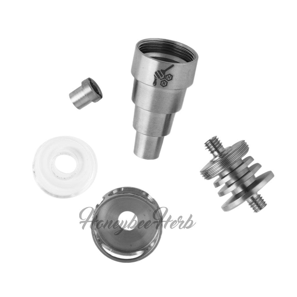A close-up, angled view of the Titanium 6 in 1 Cage Hybrid Dab Nail, showcasing its multi-part, metallic construction against a white backdrop.