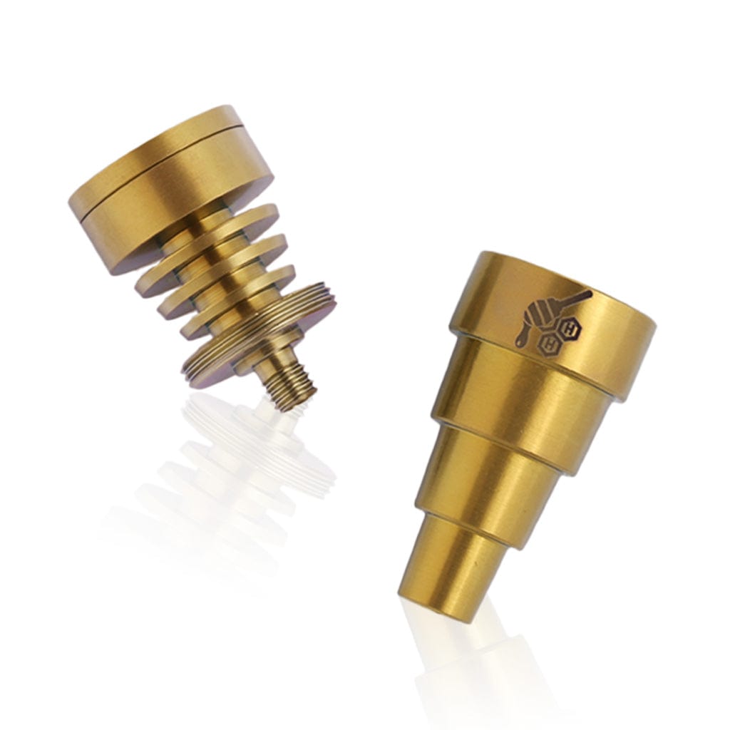 A close-up, angled view of the Titanium 6 in 1 Skillet Dab Nail, showcasing its tiered, metallic construction and reflective surface.