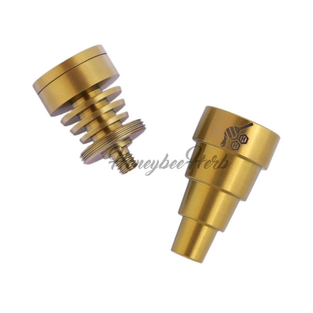 A close-up, angled view of the Titanium 6 in 1 Skillet Dab Nail, showcasing its metallic, multi-tiered construction.