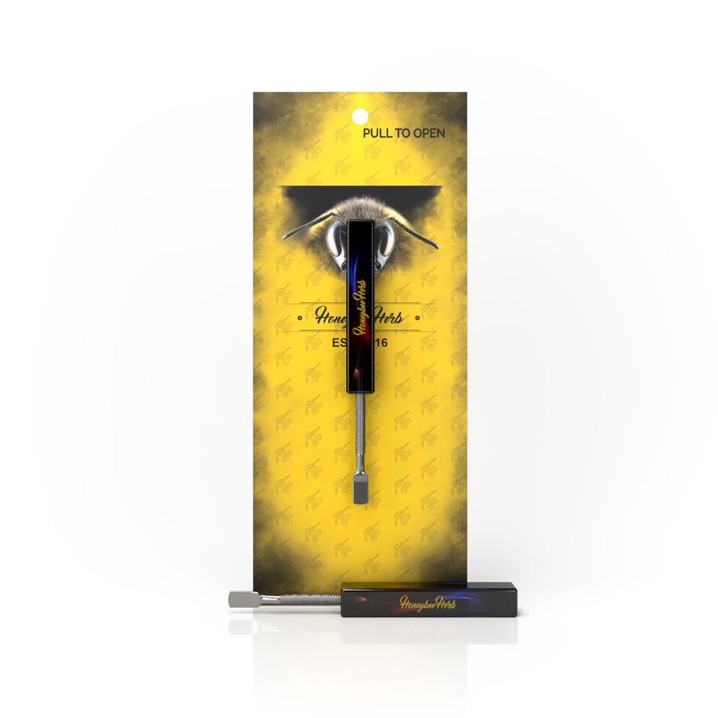 Close-up of the Resin Galaxy Dab Tool against a dark background, showcasing its sleek, metallic design.