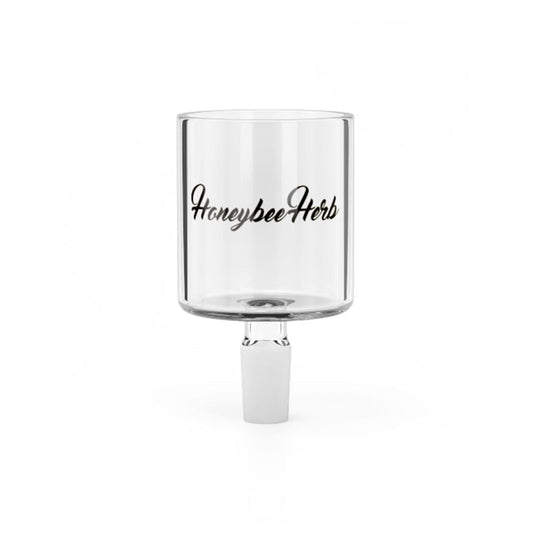 The clear glass Proxy Bowl is shown in a front view, highlighting its smooth, rounded shape and simple design.