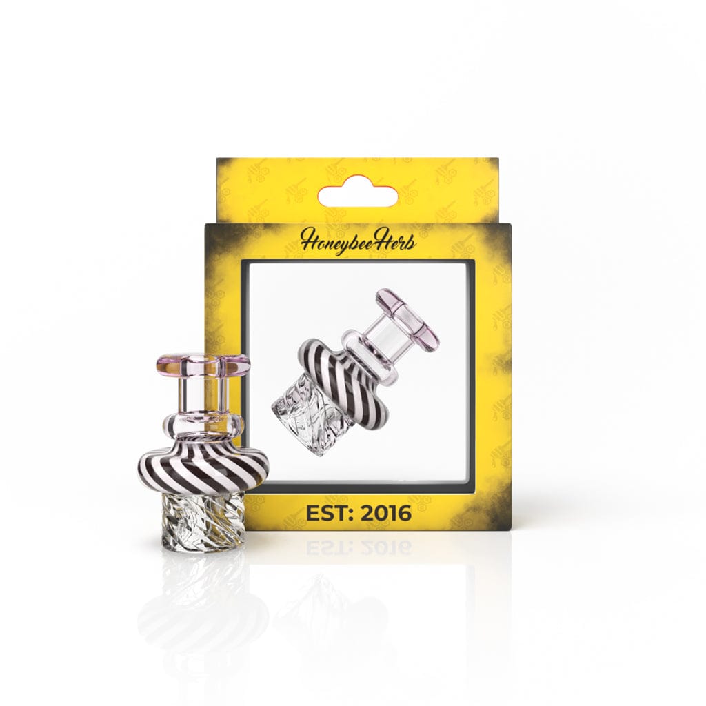 A close-up of the SWIRL TOP VORTEX CARB CAP, showcasing its swirling glass design against a dark, reflective background.