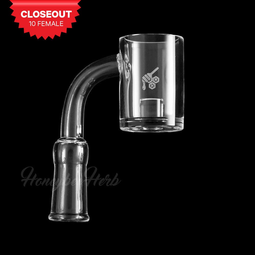 A close-up, angled view of the YL Core Reactor Quartz Banger, featuring a 90-degree bend and clear quartz construction.
