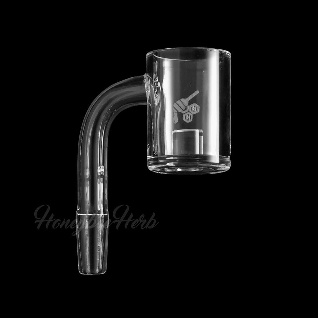 A close-up, angled view of the CORE REACTOR QUARTZ BANGER - 90° DEGREE, showcasing its clear quartz construction and right-angle design.