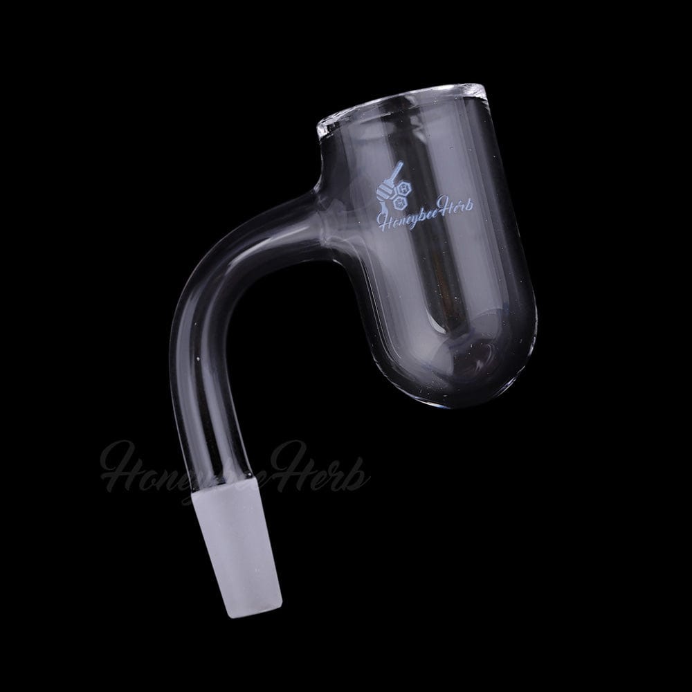 Angled close-up of the Honey Bevel Deep Bowl Quartz Banger - 90Â° Degree | Bl showing its clear glass 90-degree neck and rounded deep bowl against a black background