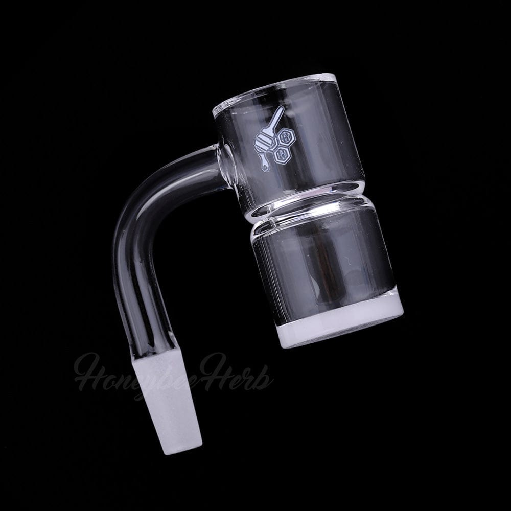Angled close-up of the HONEY & MILK BEVEL SPLASH BUCKET QUARTZ BANGER - 90Â° DEGREE | YL showing its clear 90-degree joint and frosted male connector against a black background