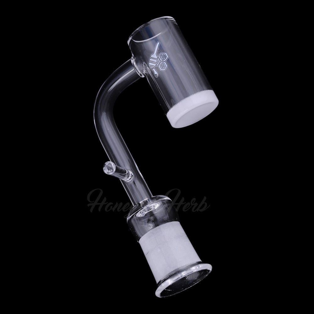 Angled close-up of the HONEY & MILK ENAIL QUARTZ BANGER - 90Â° DEGREE | YL showing the 90-degree clear quartz joint and frosted bucket against a black background
