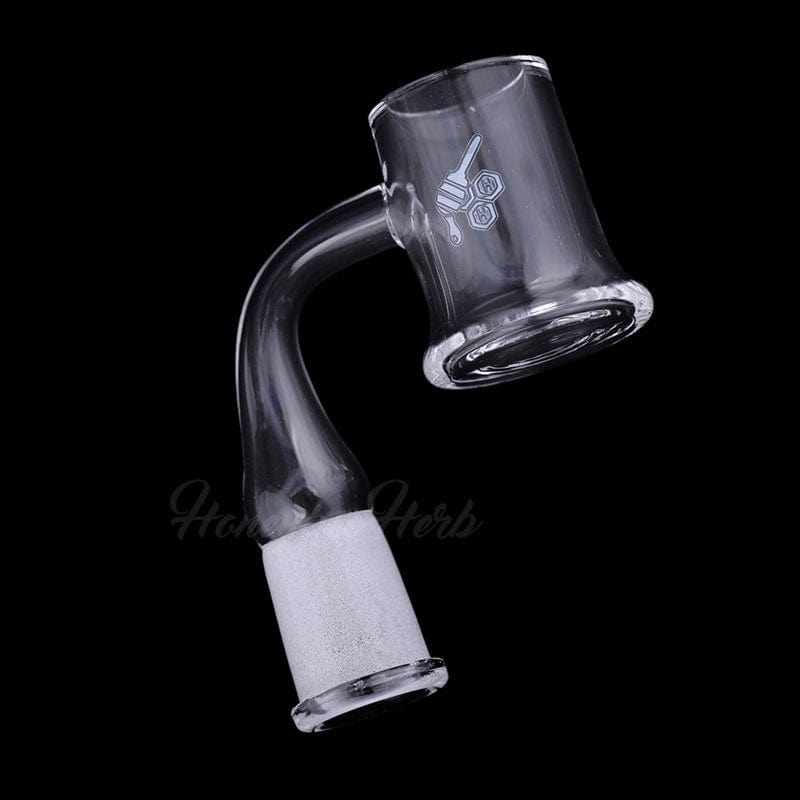 A close-up, angled view of the HONEY MUG QUARTZ BANGER - 90° DEGREE, showcasing its clear quartz construction and right-angle design.