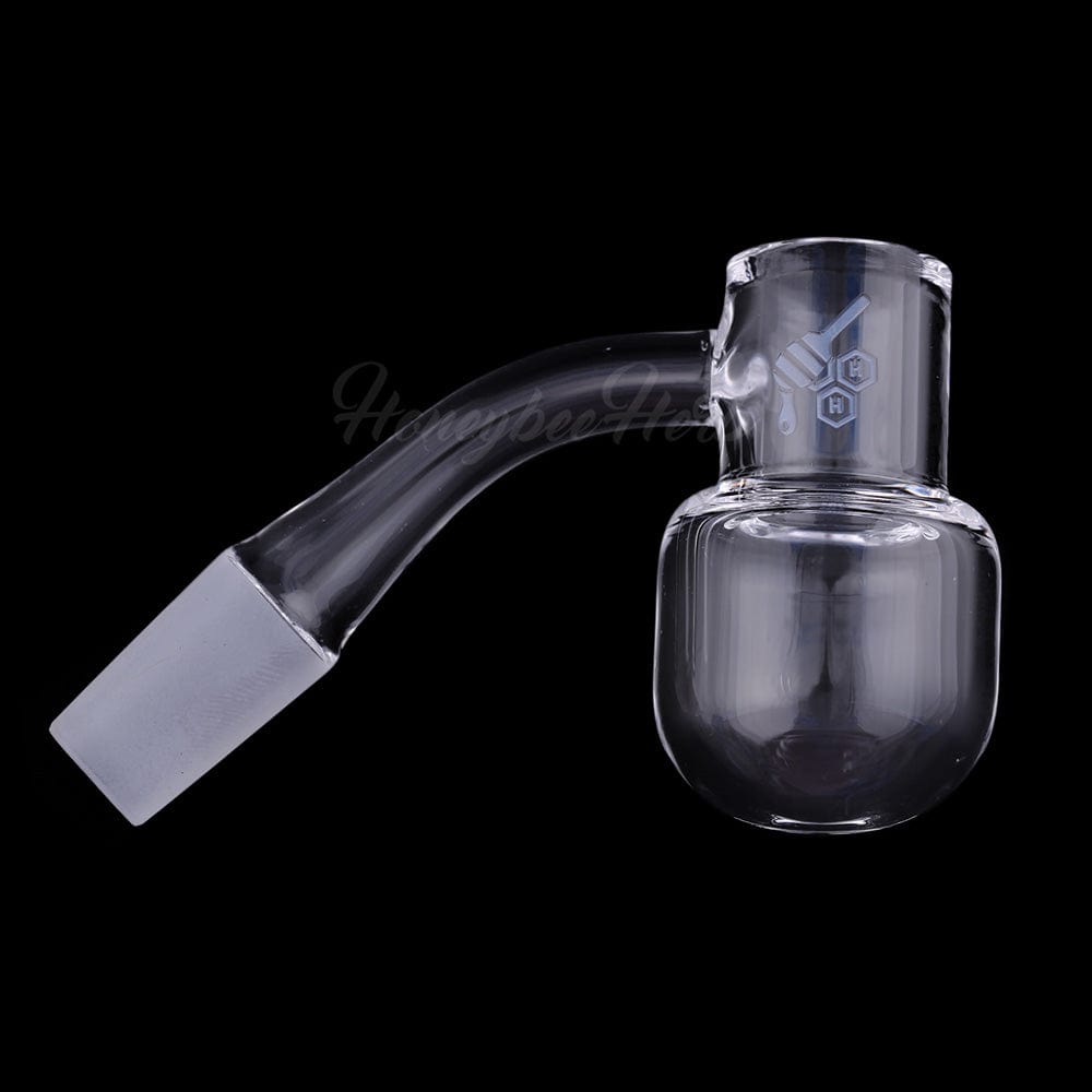 A 45-degree angled view of the HONEY KETTLE QUARTZ BANGER, showcasing its translucent quartz construction and angled joint.