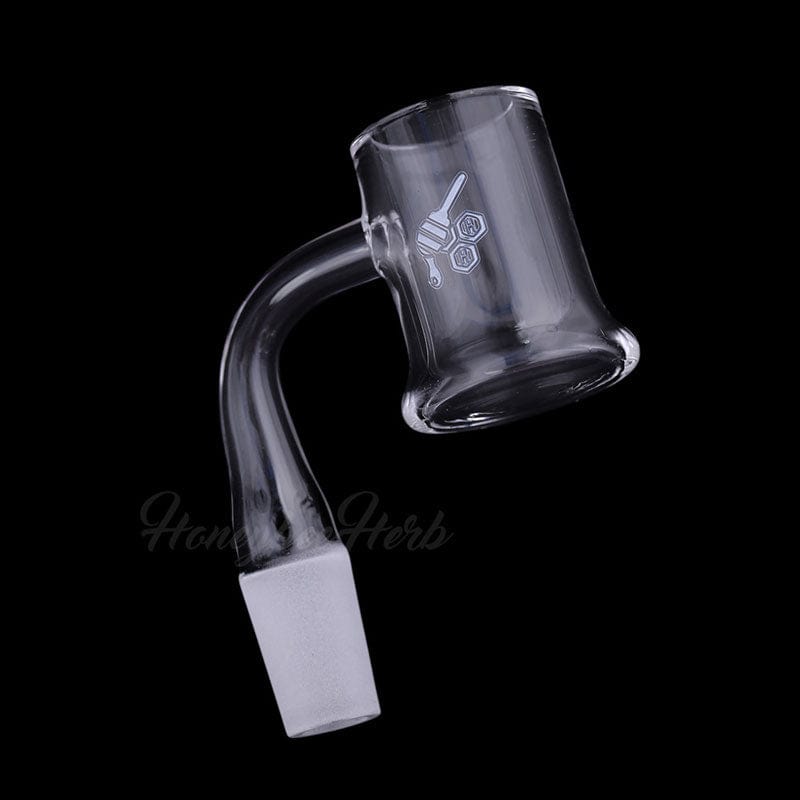 A close-up, angled view of the HONEY MUG QUARTZ BANGER - 90° DEGREE, showcasing its clear quartz construction and angled design.