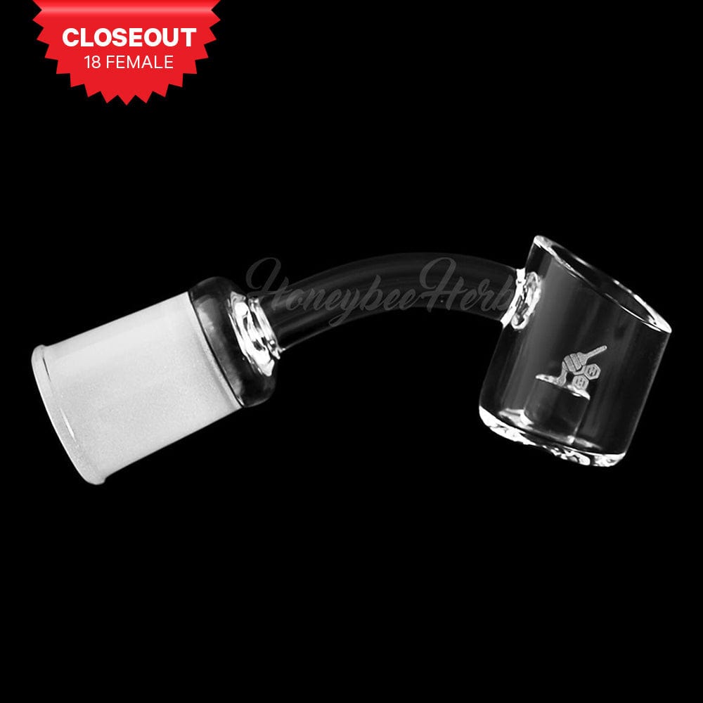 A 45-degree angled view of the CORE REACTOR QUARTZ BANGER, showcasing its clear quartz construction and smooth, rounded shape.