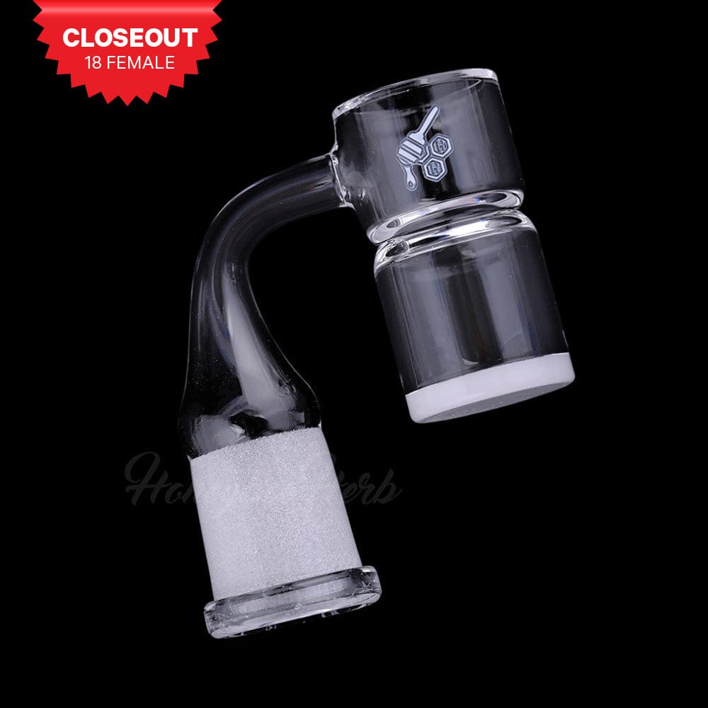 Angled close-up of the HONEY & MILK BEVEL SPLASH BUCKET QUARTZ BANGER - 90Â° DEGREE | YL showing its clear glass joint and frosted 18mm female connection against a black background