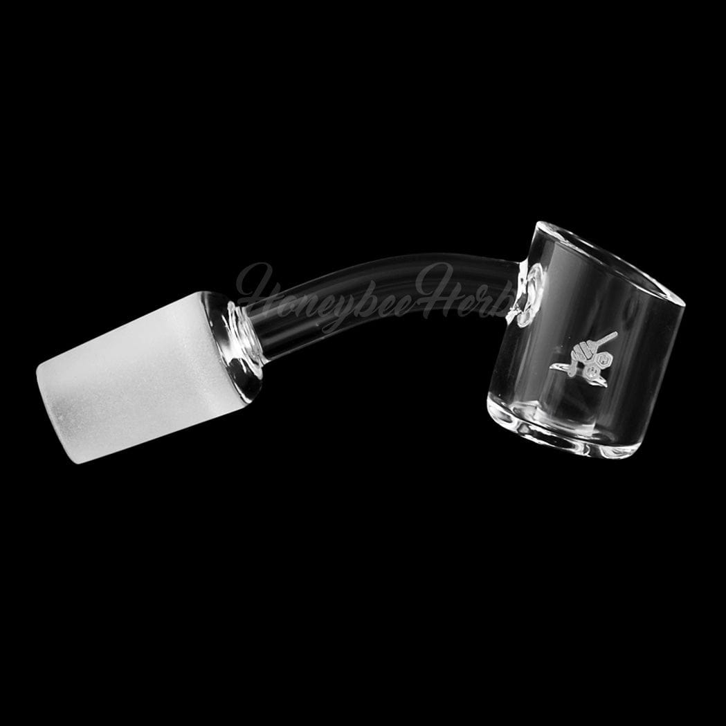 A 45-degree angled view of the YL CORE REACTOR QUARTZ BANGER, showcasing its clear glass construction and rounded shape.