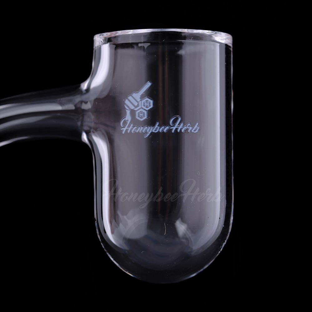Close-up front view of the Honey Bevel Deep Bowl Quartz Banger - 45Â° Degree | Bl showing its clear glass deep U-shaped bowl and subtle HoneybeeHerb logo against a black background.