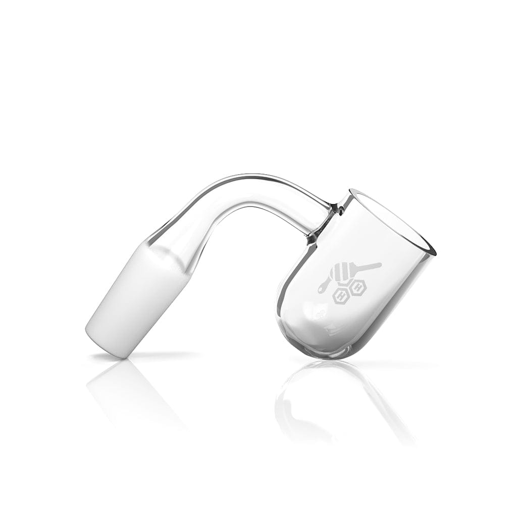 A side view of the HONEY CYCLONE QUARTZ BANGER - 90° DEGREE, showing the clear quartz banger angled on a reflective surface.