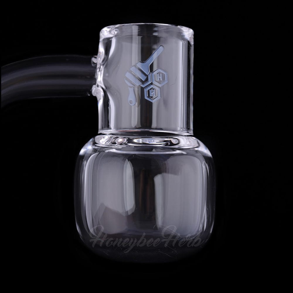 Close-up front view of the Honey Kettle Quartz Banger - 90° Degree | Yl showing its clear rounded quartz cup and angled neck against a black background.