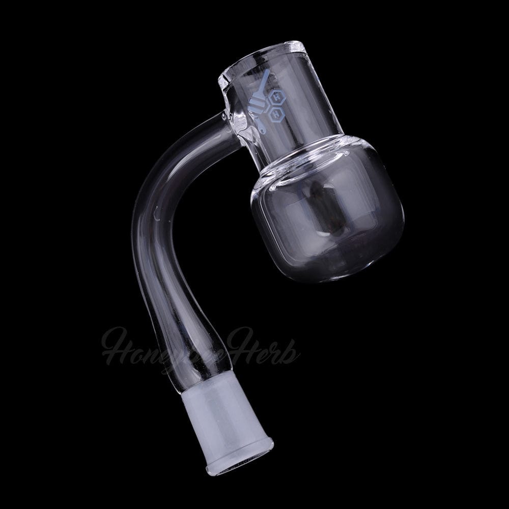 Angled close-up of the Honey Kettle Quartz Banger - 90Â° Degree | Yl showing its clear 90-degree joint and rounded bucket against a black background
