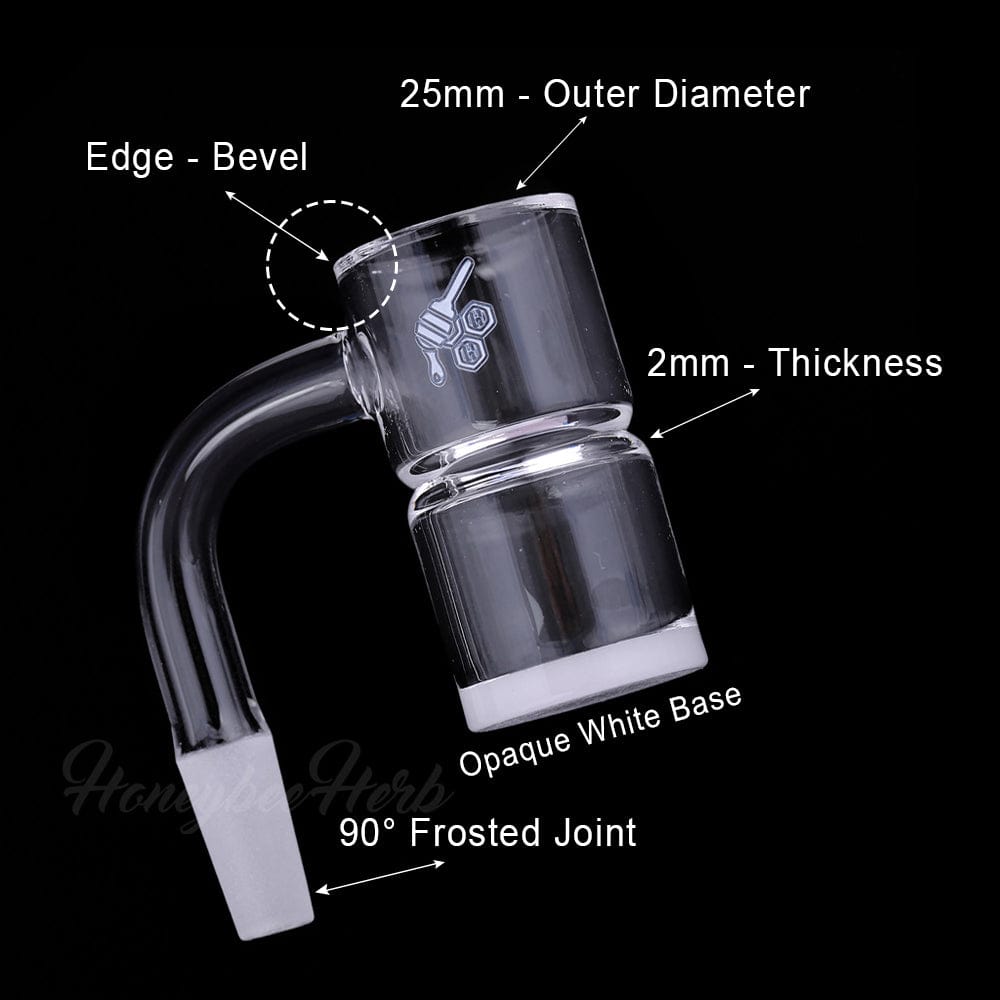 Angled close-up of the HONEY & MILK BEVEL SPLASH BUCKET QUARTZ BANGER - 90Â° DEGREE | YL showing its frosted 90° joint, opaque white base and beveled rim on a black background