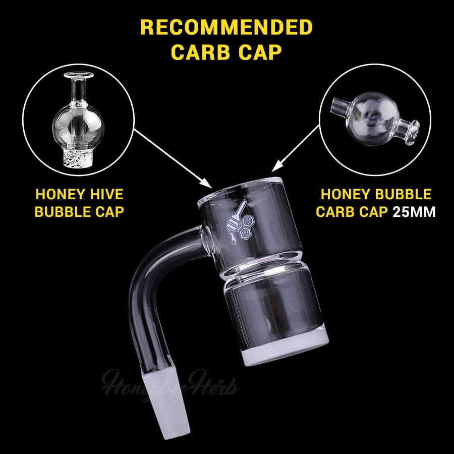 Angled close-up of the HONEY & MILK BEVEL SPLASH BUCKET QUARTZ BANGER - 90Â° DEGREE | YL showing its clear glass 90° joint and bevelled splash cup against a black background.