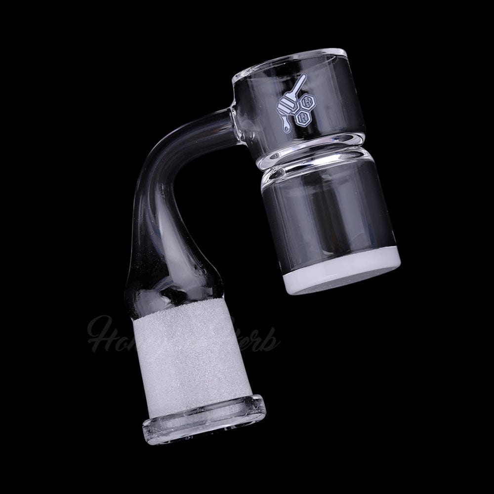 Angled close-up of the HONEY & MILK BEVEL SPLASH BUCKET QUARTZ BANGER - 90° DEGREE | YL showing clear glass joint and beveled bucket against black background
